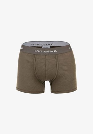 Bóxers de hombre marrón con costillas, cinturilla gris con el logo blanco de Dolce & Gabbana, bolsa frontal contorneada, bordes sin costuras.