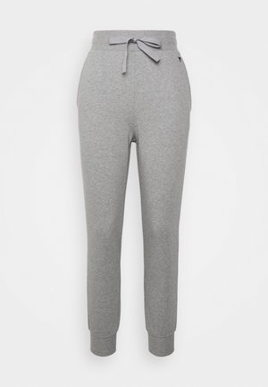 Pantaloni della tuta grigi realizzati in tessuto misto cotone, con vita regolabile tramite cordino, gambe affusolate e polsini a coste alle caviglie.