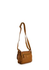 Brown leather crossbody bag with front zip pocket and adjustable shoulder strap, displayed against a white background.