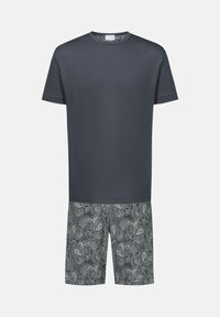 Navy cotton t-shirt paired with patterned shorts featuring a paisley design in shades of green and gray.