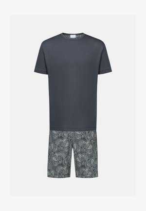 Marineblauwe katoenen t-shirt gecombineerd met gestreepte shorts met een paisley-ontwerp in groene en grijze tinten.