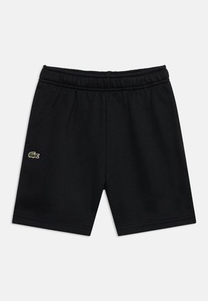 Sorte elastiske taljeshorts med Lacoste grøn krokodillelogo på venstre lår, ensfarvet design, fladt lagt på hvid baggrund.