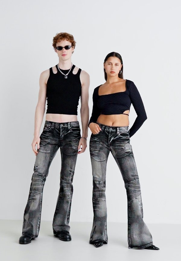 FLARED WHISKER UNISEX - Loose Jeans3