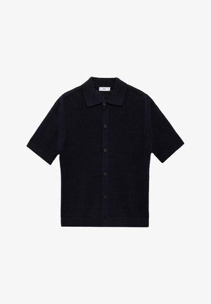 Mornarska kratka pletena kardigana s teksturiranim uzorkom, ovratnikom i prednjim kopčanjem na gumbe. Naglašena tamnim gumbima.