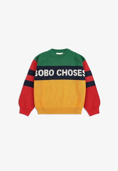 Suéter de punto multicolor con secciones en verde, rojo, marino y amarillo. Texto en negrita "BOBO CHOSES" destacado en el pecho.