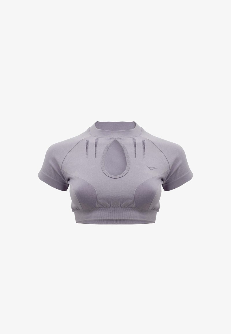 Top court à manches courtes de couleur violet clair, avec col rond côtelé, découpe en forme de trou de serrure sur le devant, et fentes de ventilation au-dessus de la poitrine.