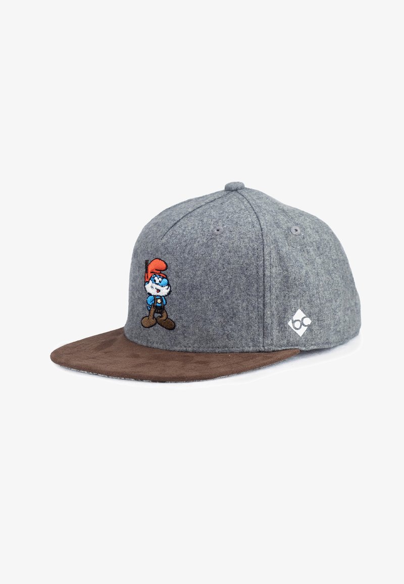 Grau wollene Mütze mit einem braunen Wildlederrand. Mit einem gestickten Charakter in Blau und Orange auf der Vorderseite und einem Logo an der Seite.