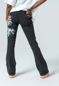 Ed Hardy KOI FISHING - Bootcut jeans - washed black