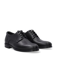 Schwarze Leder-Oxfords mit glatter Oberfläche, runder Zehenpartie und Schnürdesign. Auftretend mit niedrigem Absatz und dezenten Nähdetails.