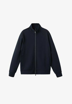 Granatowa kurtka na pełny zamek z wysokim kołnierzem, długimi rękawami, dwoma pionowymi bocznymi kieszeniami oraz ściągaczami przy mankietach i dolnym brzegu.