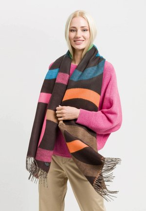 Multicolored striped scarf in brown, pink, orange, and blue, with tassels at the ends. Soft texture, wide design, draped around the neck.