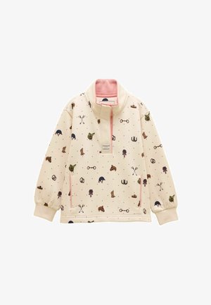 Cremefarbener Pullover mit pinkfarbenem Kragenfutter, verziert mit reitsportbezogenen Symbolen wie Stiefeln, Helmen, Hufeisen und Sätteln, sowie vorderen Reißverschlusstaschen.