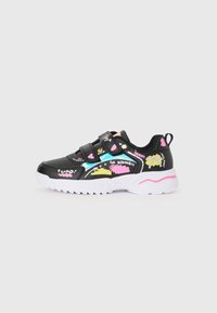 Black sneaker with a smooth synthetic upper, featuring colorful doodles, Velcro straps, and a chunky white sole with pink accents.
