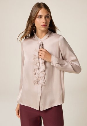 CON VOLANT - Blusa - rosa