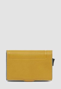 Yellow leather wallet with a smooth texture, slim design, single compartment, and blue interior accent. Features simple stitching detail.