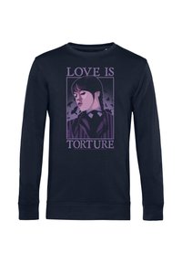 Felpa blu navy con una grafica viola di una ragazza con trecce e pipistrelli, e la scritta "L'amore è tortura" sopra e sotto di lei.