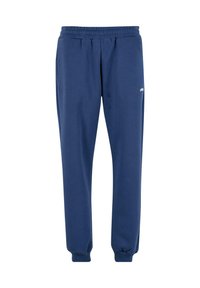 Marineblauwe joggers gemaakt van zachte stof, met een elastische tailleband, taps toelopende benen en een klein logo aan de zijkant.