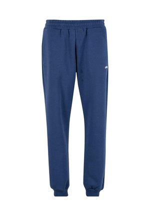 Pantaloni jogger blu navy realizzati in tessuto morbido, con vita elastica, gambe affusolate e un piccolo logo di lato.