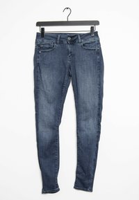 Mörkblå denim skinny jeans med midjehöjd, fem fickor och en slät textur, stängs med en knapp och dragkedja.