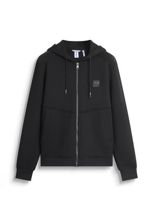 Zwarte zip-up hoodie met een capuchon, voorzakken, ribgebreide boorden en een textuur logo-opdruk op de borst. Gemaakt van zachte stof.