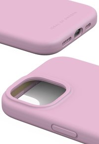 Pink silicone phone case with a smooth texture, precise cutouts for ports, and a recessed area for camera lens access.