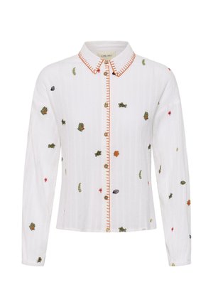 Witte blouse met lange mouwen en knopen, met een kraag en knopenlijst met oranje stiksels, voorzien van kleine meerkleurige geborduurde bloemen en bladeren.