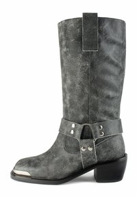 Gray leather knee-high boot with a distressed finish, silver toe cap, accented strap with metal stud details, and a chunky black heel.