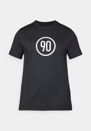 T-shirt en coton noir avec un graphique circulaire blanc portant le numéro "90" au centre. Design classique avec col rond et manches courtes.