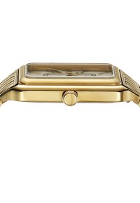 Montre rectangulaire dorée avec un boîtier texturé, une lunette lisse et une couronne unique sur le côté. Présente un cadran minimaliste avec des aiguilles fines.