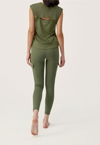 Born Living Yoga Tights - dark green