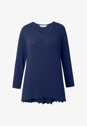 Camisa de manga larga azul marino con cuello en V, dobladillo ligeramente acampanado con borde rizado y corte relajado.