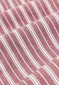 Textile with a maroon base featuring narrow white stripes. The fabric has a soft texture and a subtle pattern, arranged in horizontal rows.