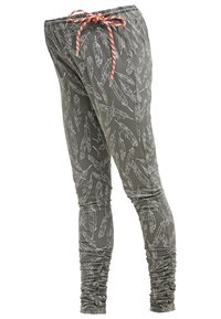 Šedé legíny s bílým vzorem peří, elastickým pasem s červenou a bílou šňůrkou a nařasením na manžetách.