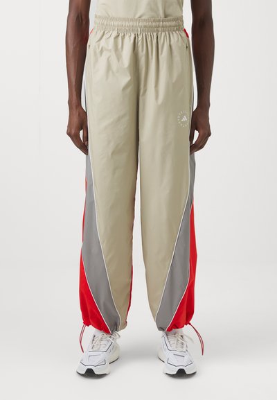 adidas by Stella McCartney PANT - Teplákové kalhoty - desert sand/active red