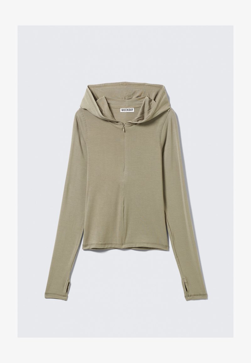 Felpa con cappuccio verde chiaro a maniche lunghe con zip frontale, texture morbida e aperture laterali ai polsini, realizzata in materiale leggero ed elastico.