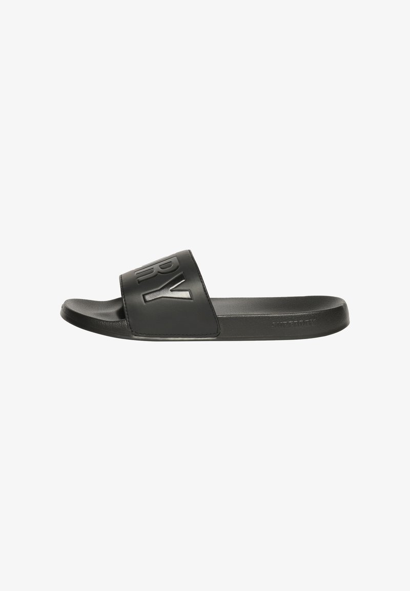 Sort slidesandal lavet af glat syntetisk materiale. Har en bred rem med forhøjet logo, flad sål og minimalistisk design.