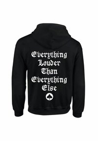 Sudadera negra con capucha que presenta un texto blanco que dice "Todo más fuerte que todo lo demás", con un gráfico de trébol en el centro.