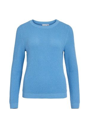 Mėlynas, tekstūruotas megztinis su apvalia iškirpte ir ilgomis rankovėmis. Susiūtas su ribuotu rankogaliu ir apačia, kad būtų prigludęs.