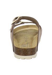 Brown leather sandal with adjustable strap and gold buckle. Textured insole and light-colored, cushioned sole. Simple and functional design.