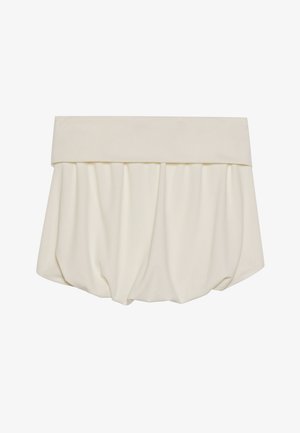 Jupe crème avec une large ceinture pliée et un tissu froncé formant une silhouette lâche en forme de ballon. Texture lisse et douce.