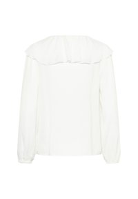Blouse blanche à manches longues avec large col volanté, poignets élastiques et dos droit, présentée sur un fond blanc uni.