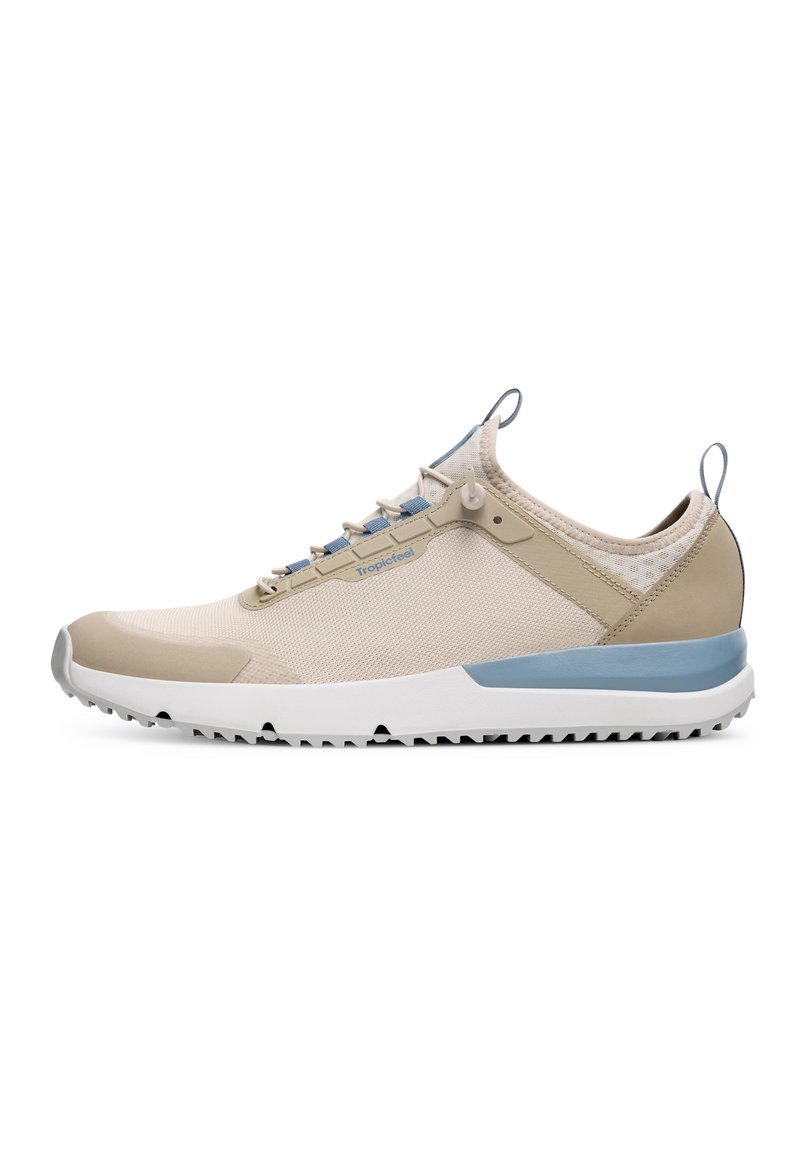 Beige athletic shoe with mesh upper, light blue accents, and a rubber sole featuring a textured tread pattern. Laces integrated into design.
