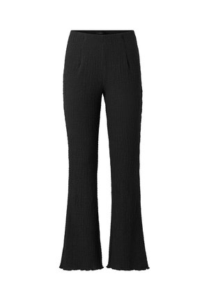 Sorte teksturerede bukser med en svag vidde ved benenden, der har en tætsiddende talje og et glat, sømfrit design.