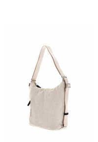 Sac à épaule en velours côtelé beige avec une texture douce, une bandoulière réglable, des éléments en métal argenté et une poche zippée sur le côté.