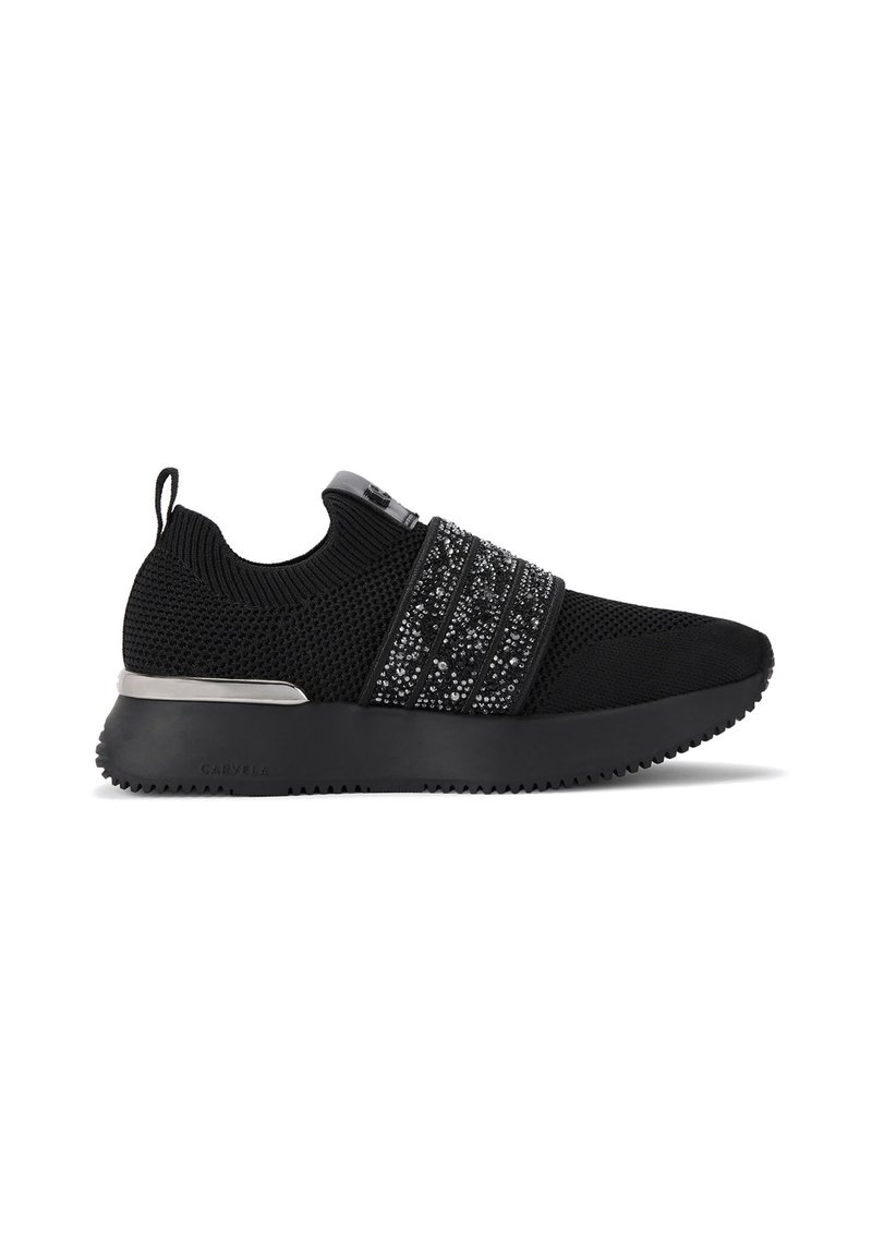 Scarpe da ginnastica in maglia nera con fascia decorativa nera e argentata, suola in gomma e un pannello di attacco sul tallone per indossarle facilmente. Finitura testurizzata.