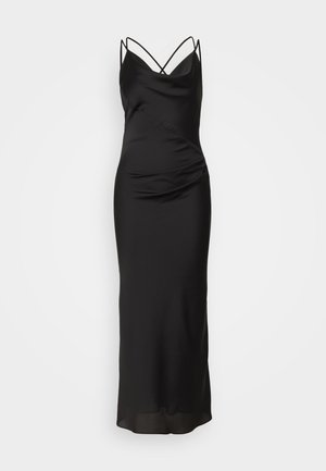 Black satin slip dress with a fitted silhouette, featuring thin crisscross straps and a subtle draped detail along the front.