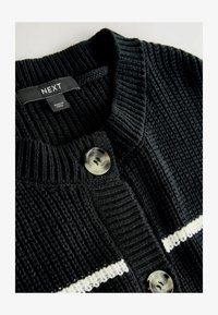 Odabrano, black stripe