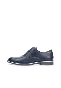 Dark blue leather shoes with a smooth finish, featuring five eyelets, contrasting stitching, and a white rubber sole with a black edge.