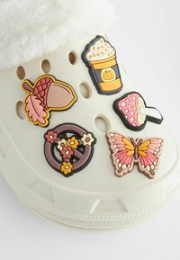 Next Hausschuh - neutral pumpkin badge