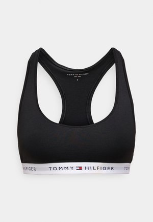 Črni športni modrček z izrezom v obliki žlice in zasnovo z racerback hrbtom. Ponaša se z belim elastiko z logotipom "TOMMY HILFIGER". Velikost S.